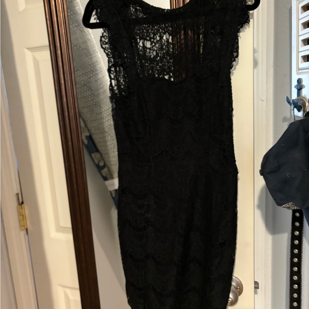 Free people classic lace dress. Never worn, still has tags.